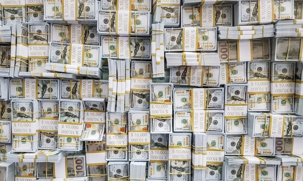 Dólar recua para R$ 5,14 com alívio global e apetite por risco